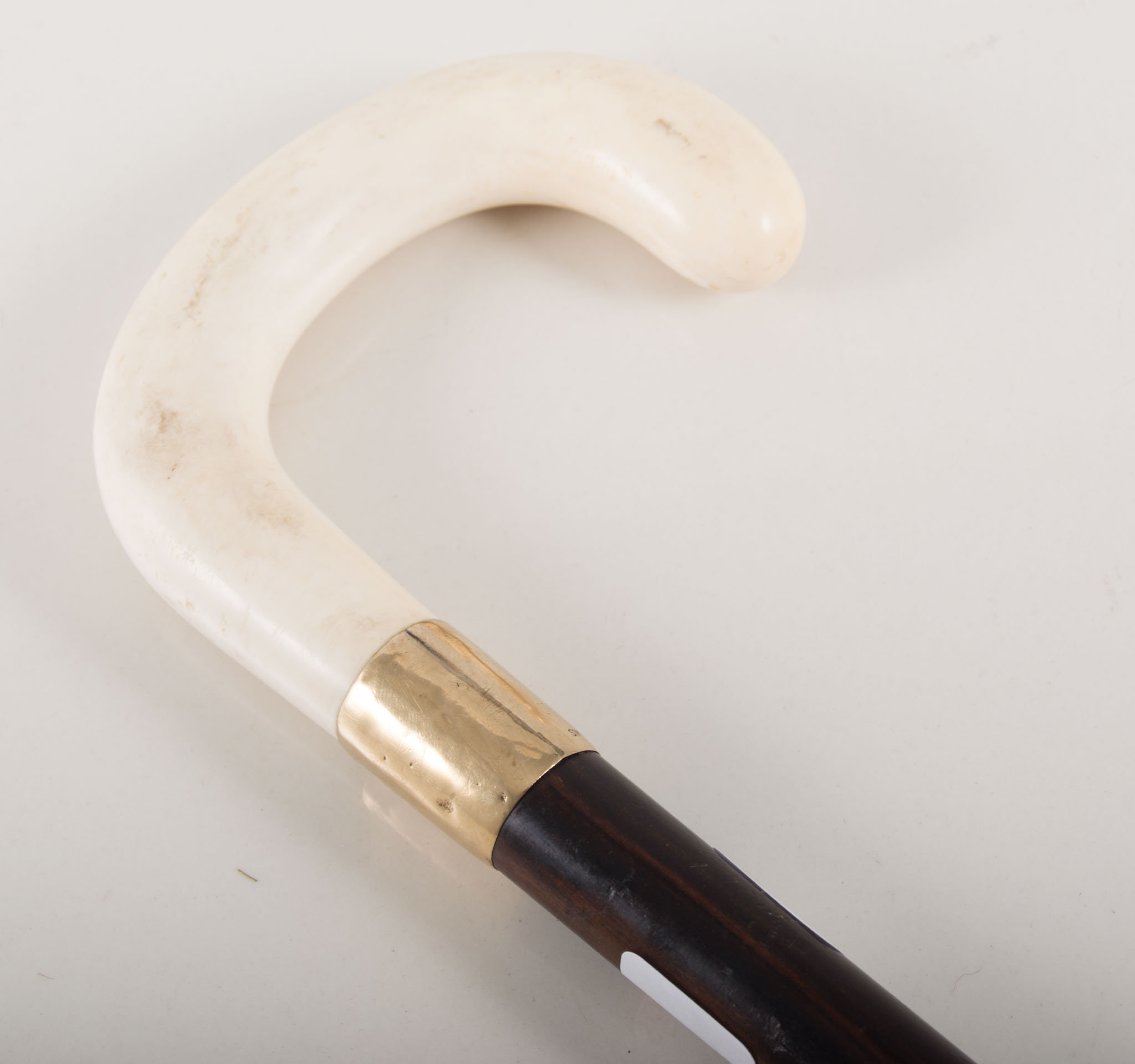Gold mounted walking stick, with ivory handle.