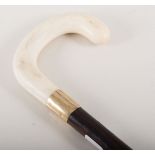 Gold mounted walking stick, with ivory handle.