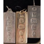 9ct gold one ounce bar and two one ounce silver bars, (3).