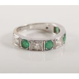 18ct white gold diamond and emerald eternity ring.