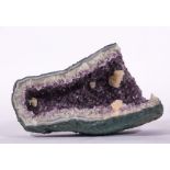 Large concave amethyst geode specimen, 50cm x 30cm, having other white quartz crystals,