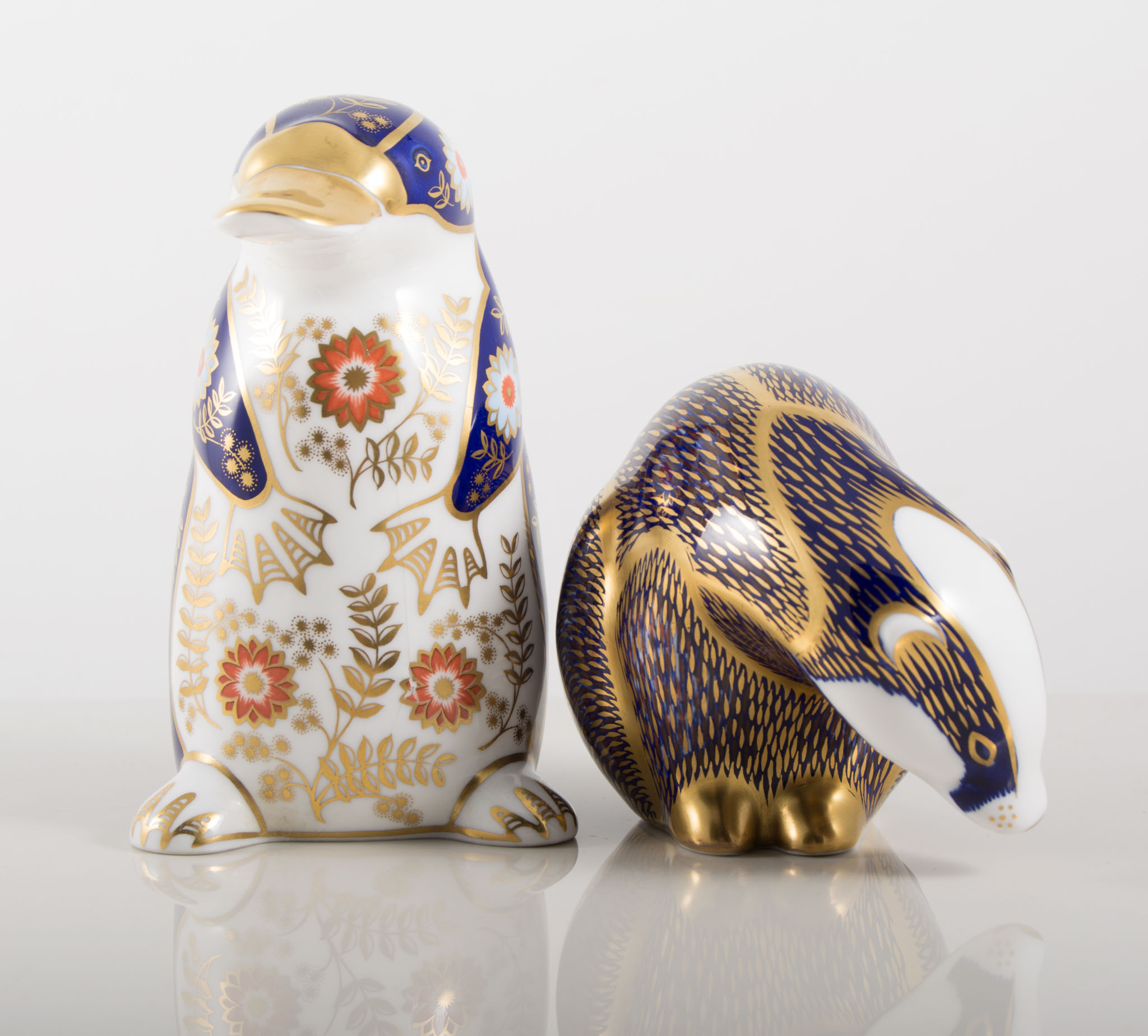 Royal Crown Derby paperweights, a Badger and a Platypus, (2).