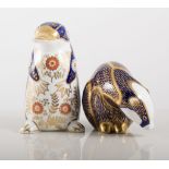 Royal Crown Derby paperweights, a Badger and a Platypus, (2).