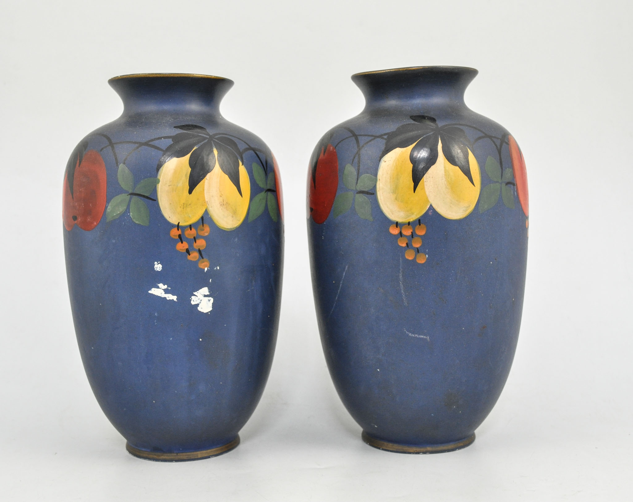 Pair of Mona vases, height 23cms, and a spill vase (3).