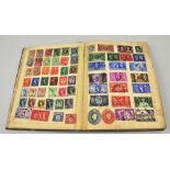 A stamp album and contents.