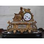 19th Century French gilt spelter mantel clock, with a figured surmount and alabaster panels,