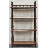 Victorian walnut open book shelf, top with a three quarter spindle gallery, width 62cm.