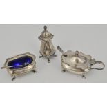 Small silver three piece cruet, comprising pepperette, mustard and salt, blue glass liners,