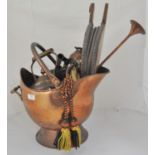 A Victorian copper waming pan, copper kettle, coal scuttle, a flat iron, pair of wooden bellows,