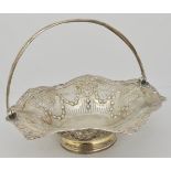 Victorian silver basket, swing handle, pierced and embossed, circular foot, TB, London,