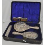 Art Nouveau silver three piece dressing table set, cased.