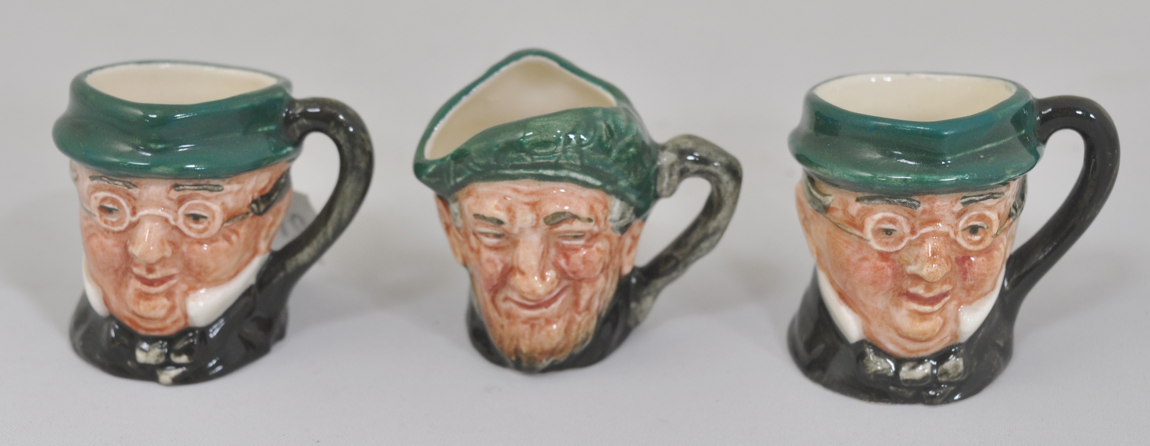 Three miniature Royal Doulton pottery character jugs, height 3.5cms. - Image 2 of 3