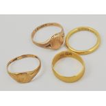 Four gold rings - two hallmarked 22ct yellow gold wedding bands, weighing 8.