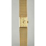 Ladies 9ct gold Omega wristwatch, rectangular dial with baton markers, integral bracelet strap,
