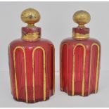 Pair of Continental ruby glass scent bottles, (damaged).