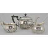 Three piece silver teaset.