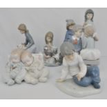 Lladro group, of two sleeping babies, width 16cms, and six Nao models of children, (7).