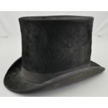 Black silk top hat.