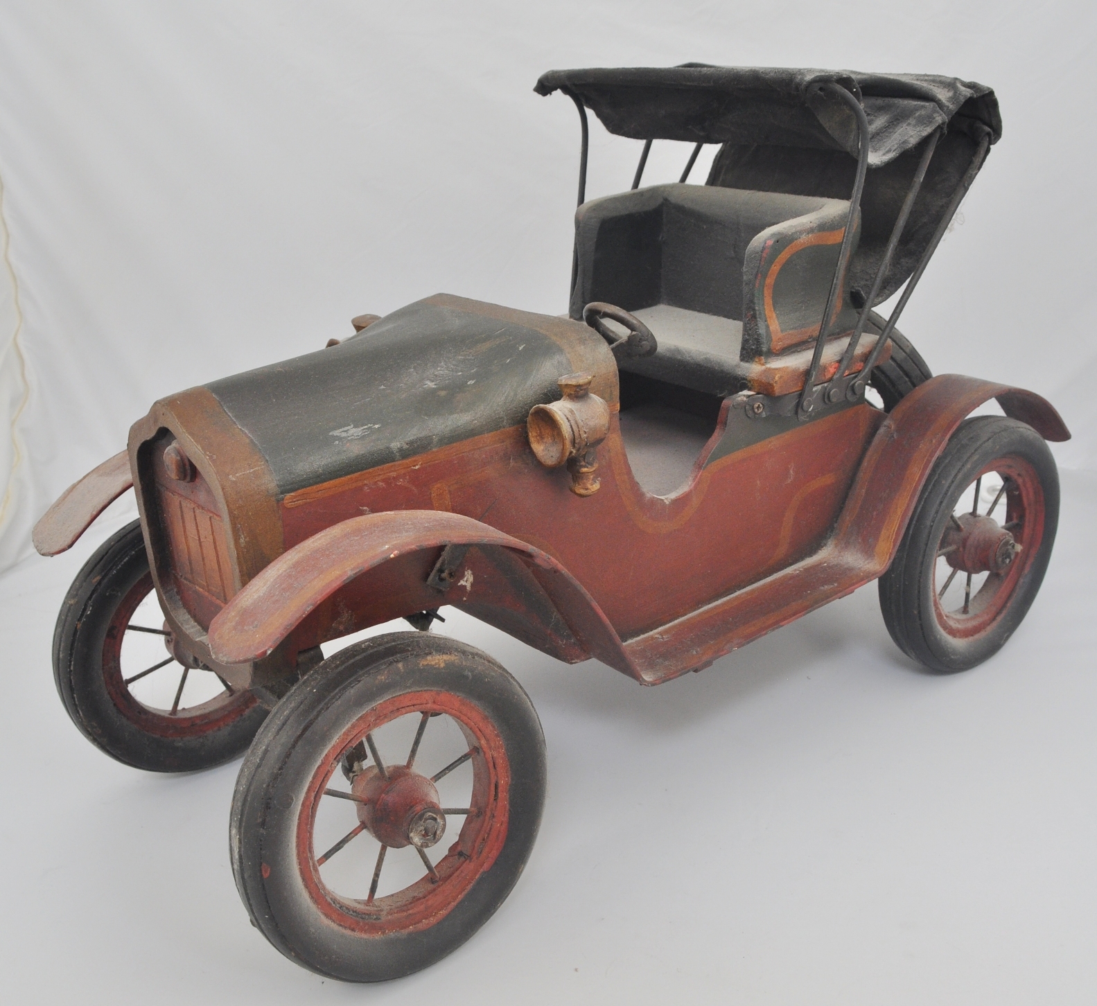 A model of a vintage car and an ice cream trolley, (2).