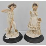 Pair of Capo di Monte figures of a boy and girl, and three Capo di Monte models of birds (5).