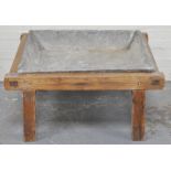 A lead salting trough on a pine stand 90x71cm, and a pair of stilliards (2).