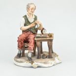 Capodimonte porcelain figure, Watch Maker, signed Marcini, height 28cm, another, The Copper Beater,