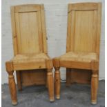 Set of eight pine kitchen chairs, panelled backs, cane seats, height 104cm.