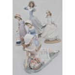 Lladro figure, Girl in a bonnet on a windy day, 37cms and four other Lladro figurines, (5).