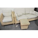 Cane sofa and matching armchair, loose cushions, (2).