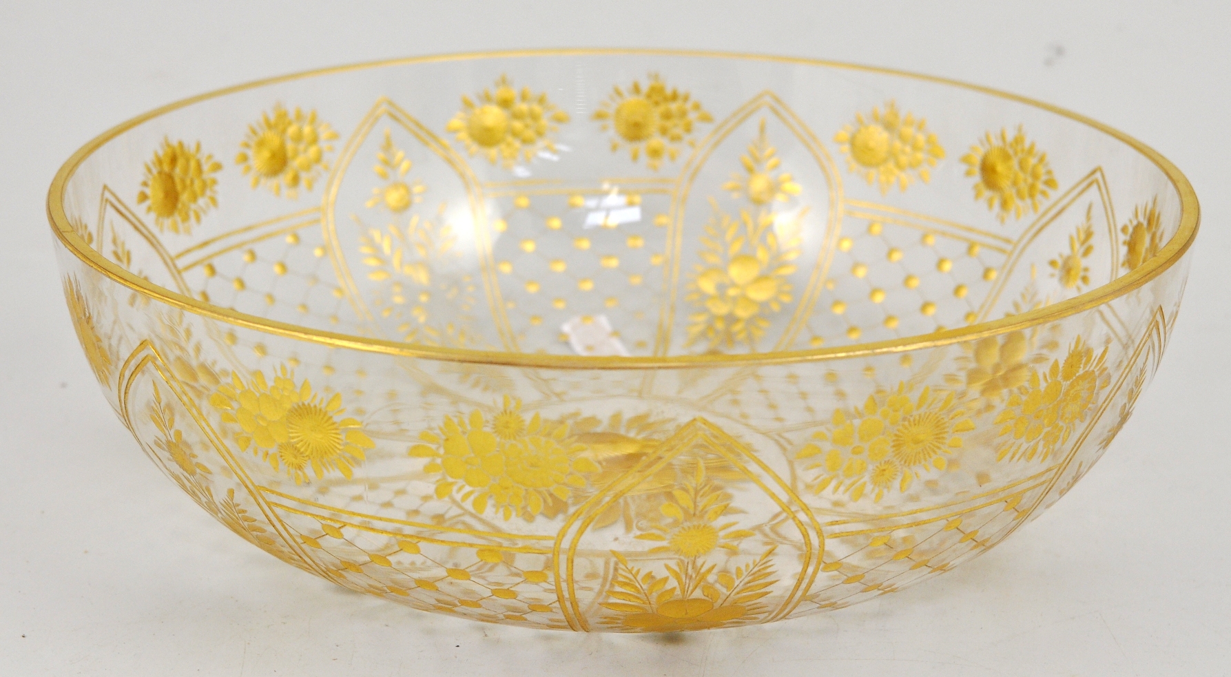 A Continental cut glass bowl, the decoration heightened in gilt, diameter 24cm.