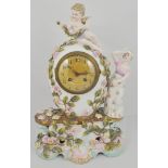 Continental porcelain mantel clock, ovoid urn shape form, cherub finial, an attendant lady,