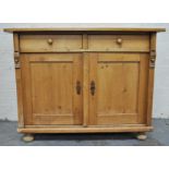 Continental pine sideboard, two drawers above a cupboard, 118cm.