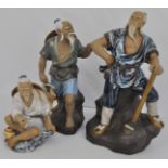 Three Chinese stone-glazed figures, 24cm and smaller, (3).