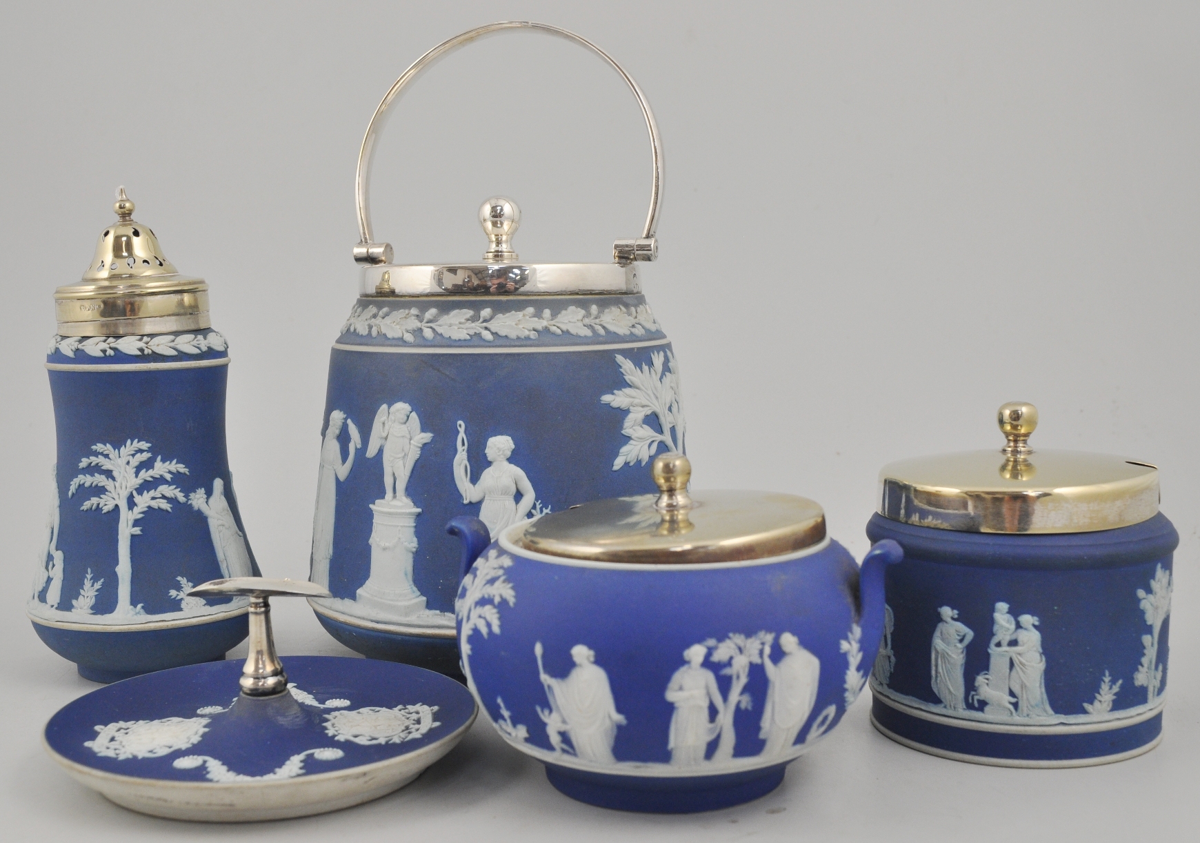 Wedgwood blue Jasper biscuit barrel, EP mounts, 23cm, other Jasper ware and three cabinet plates.