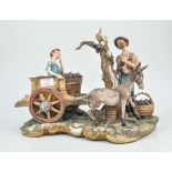 Large Capodimonte porcelain group, "La Vendemmia" (The Grape Harvest), signed Volta, length 42cm.