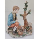 Pair of Capodimonte porcelain figures, Boy and Girl collection fruit, signed Volta, height 19cm,