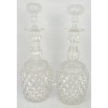 Pair of Waterford style cut glass decanters, with stoppers, height 24cm.