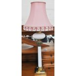 A Victorian brass and opaque glass Corinthian column oil-lamp, adapted with a lampshade,