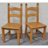 A set of 6 beech ladder back dining chairs, hight, 101cm.