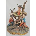 Large Capodimonte porcelain group, Three Boys around the Camp Fire, signed Volta, height 34cm.