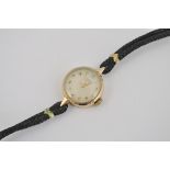 Lady's 9ct gold cased, Tudor wristwatch, cord strap.