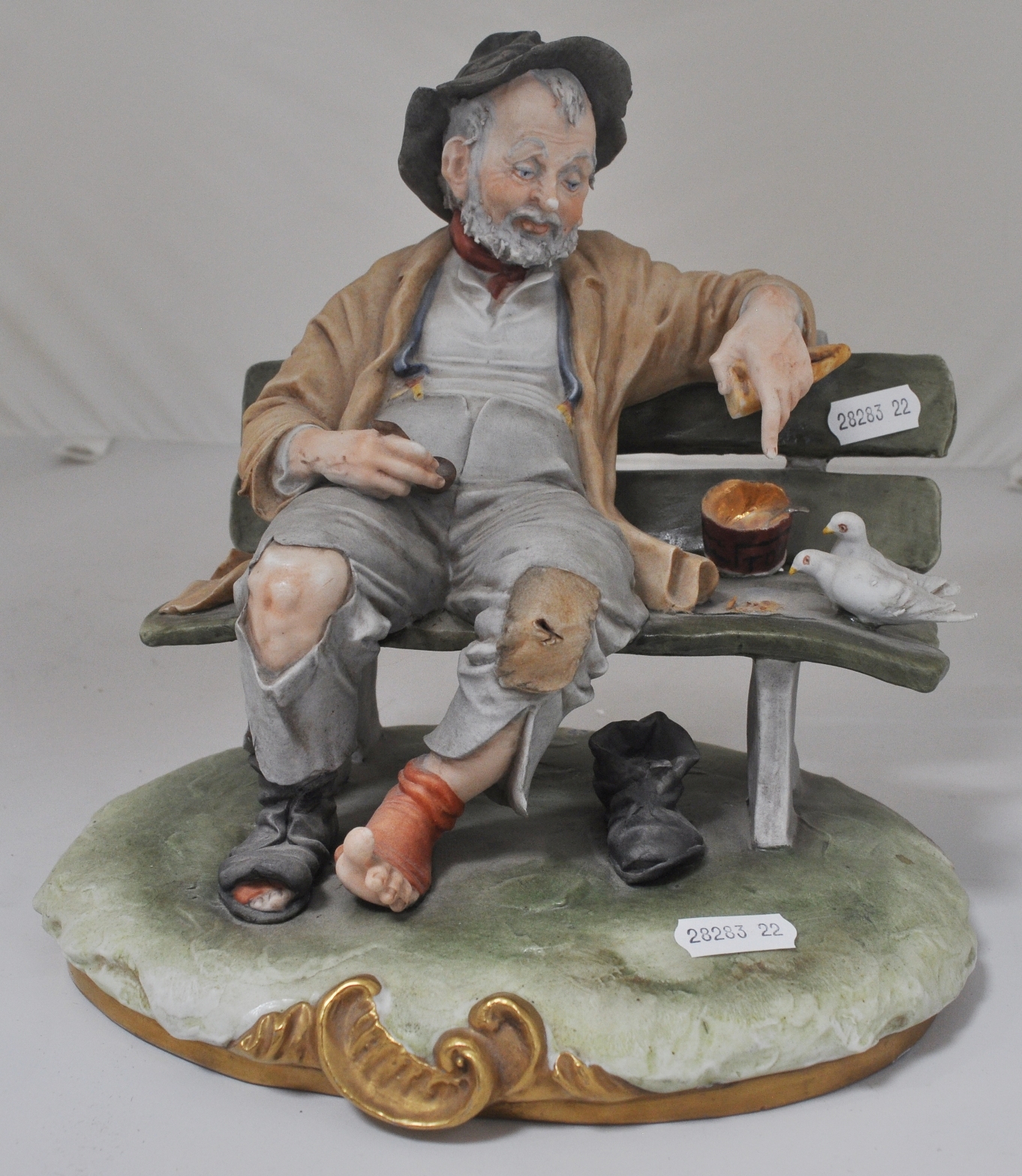 Capodimonte porcelain model, figure on a bench, signed B Merli, height 22cm, another similar, (2). - Bild 2 aus 2