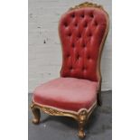 A 19th Century gilded hoop back nursing chair, buttoned upholstery, 51cm.