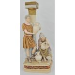 A Royal Dux style lamp column, with figures and water flagons, mark 291 to base, 40cms.