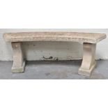 Two carved stone benches, curved tops, 139cm.