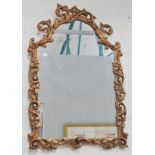 Wall mirror, gilt scrolled frame, 81x53cm.