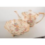 Fieldings Crown Devon pottery teapot stand, height 18cm, and two salad bowls and plates, (6).