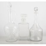 Twenty eight cut and moulded decanters.