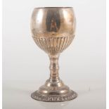 White metal goblet, indistinctly marked, semi-fluted form, domed base, 16cms.