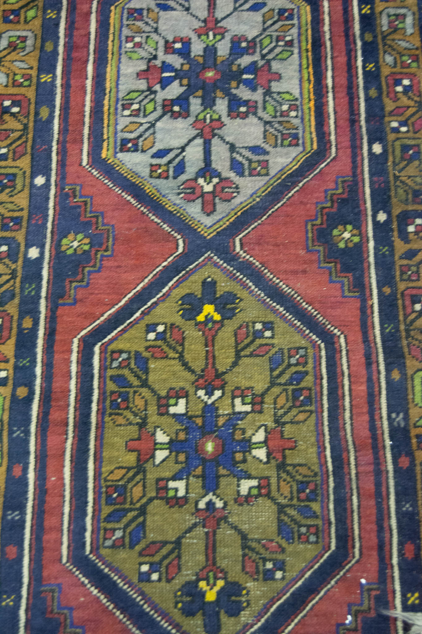 Beluchi runner, central field in red with stylised geometric decoration, 380 x 72cms. - Image 3 of 3